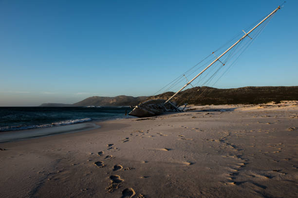 istock a yacht laying on the beach 1125909575