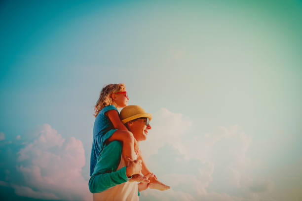 istock happy father and little daughter play at sky 1125909727