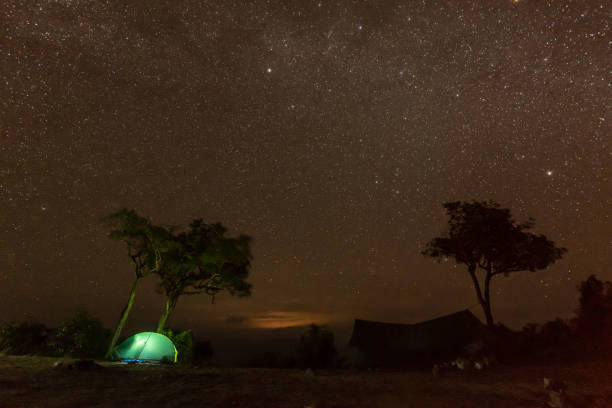 istock Camping fire under the amazing starry sky 1125909768