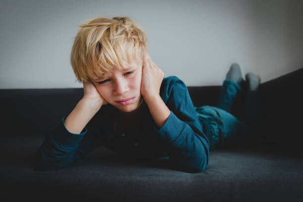 istock sad child, stress and depression, pain, sorrow 1125911252