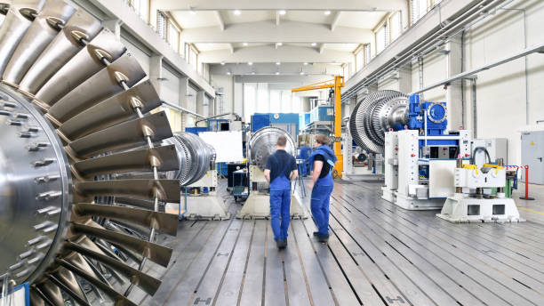 istock workers assembling and constructing gas turbines in a modern industrial factory 1125911512