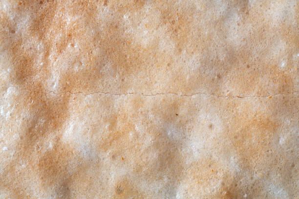 istock Kaw Kriab Wow made from sticky rice is cracking, Traditional Thai snack, Close up & Macro shot, Abstract background 1125912785