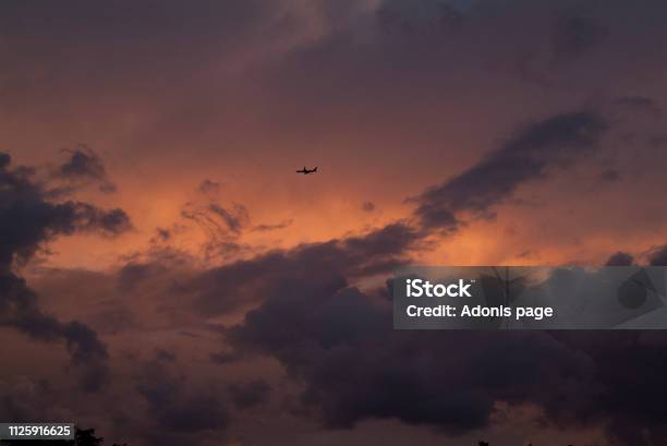 Auburn Nights Sky Captain Stock Photo - Download Image Now - Airplane, Atmosphere, Atmospheric Mood