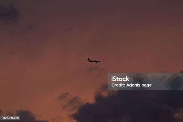 Auburn Nights Sky Captain Stock Photo - Download Image Now - Airplane, Atmosphere, Atmospheric Mood