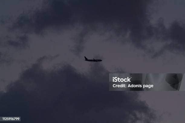 Auburn Nights Sky Captain Stock Photo - Download Image Now - Airplane, Atmosphere, Atmospheric Mood