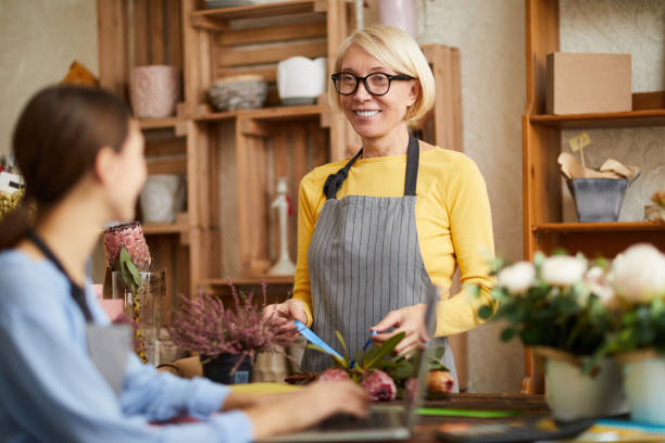 istock Women in Flower Shop 1125917197