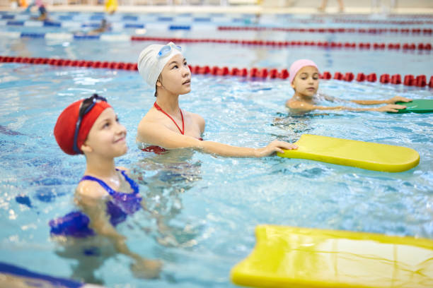 istock Girls learning to swim 1125923912