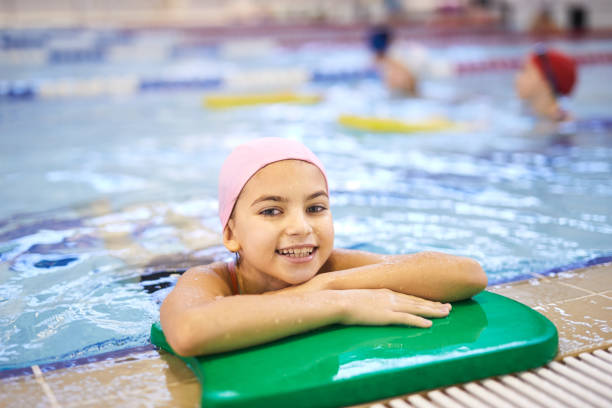 istock Girl in swimming pool 1125923919