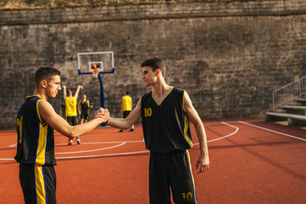 istock Two basketball players before game 1125926348