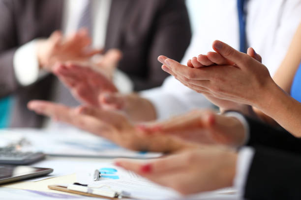istock Group of people clap their arm in row during seminar 1125926470