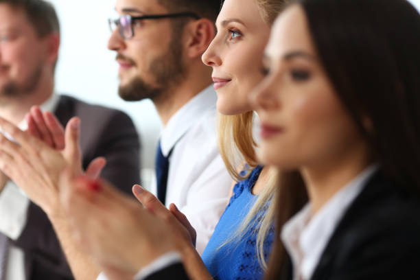 istock Group of people clap their arm in row 1125926471
