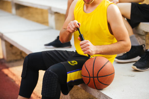Pumping Up 140+ Man Pumping Ball Stock Photos, Pictures & Royalty-Free Images - iStock