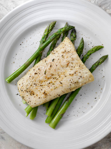 istock Butter Poached Halibut with Asparagus 1125931352
