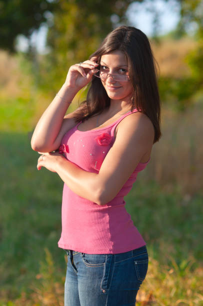 istock Young woman in the summer nature 1125931420