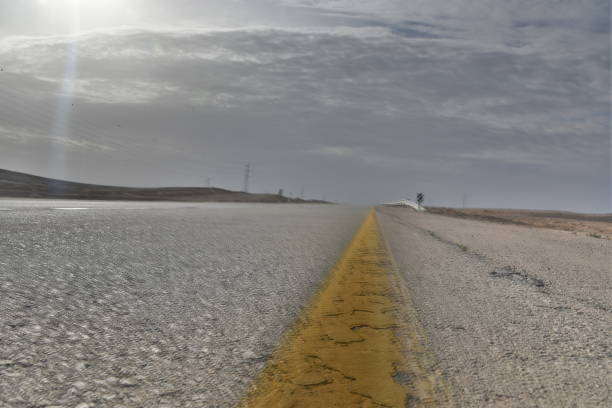 istock Desert road looking from the ground, HDR 1125935524