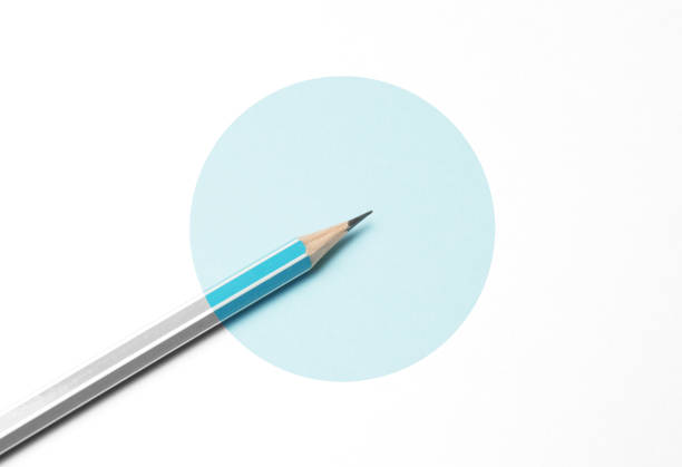 istock Blue pencil on a white background, minimalism. Abstract art, imagination, education 1125939744