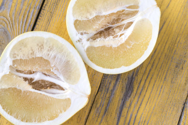 istock Pomelo on the wooden table 1125941265