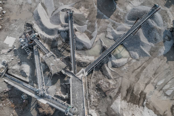 istock Aerial view of crushed stone quarry machine in a construction material factory 1125941421