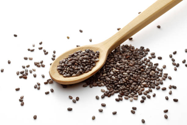 istock Chia seeds and wooden spoon 1125941574