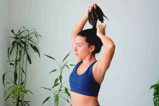 istock Young woman doing yoga 1125941799