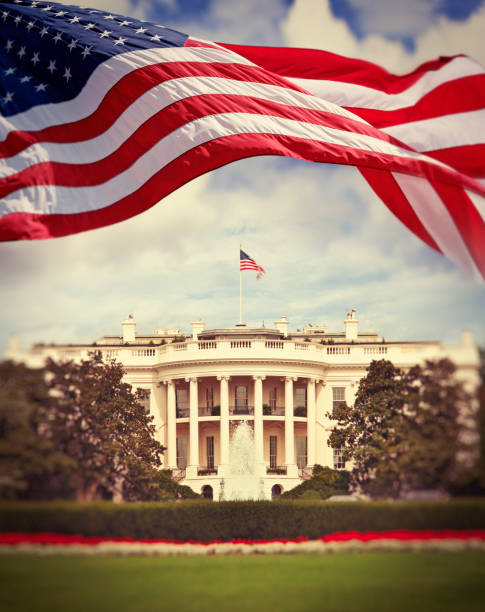 istock The White House and waving US flag 1125942807