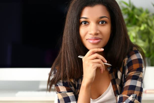istock Beautiful black woman portrait look at camera 1125943385