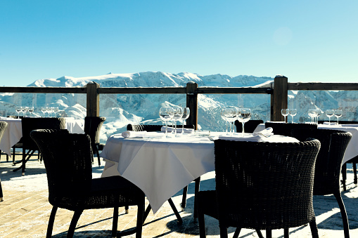 Alpine outdoor restaurant at ski resort in Alps, France