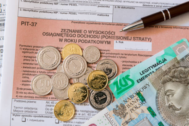 Polish tax form PIT-37 for individual tax return Polish tax form, PIT-37, close up, coins, individual tax return number 37 stock pictures, royalty-free photos & images