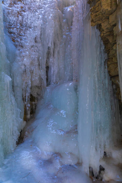 istock Frozen waterfall in a gorge high in the mountains 1125948351