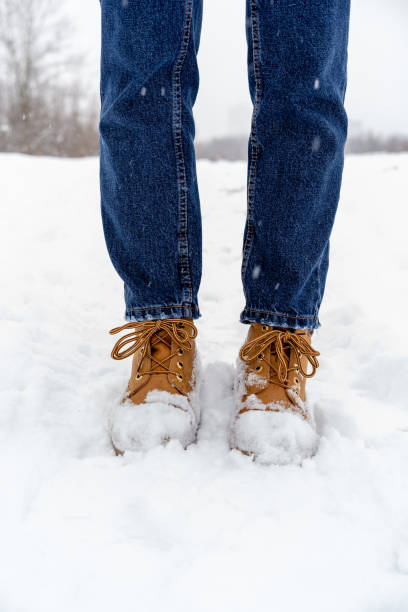 istock Girl in winter forest 1125949985