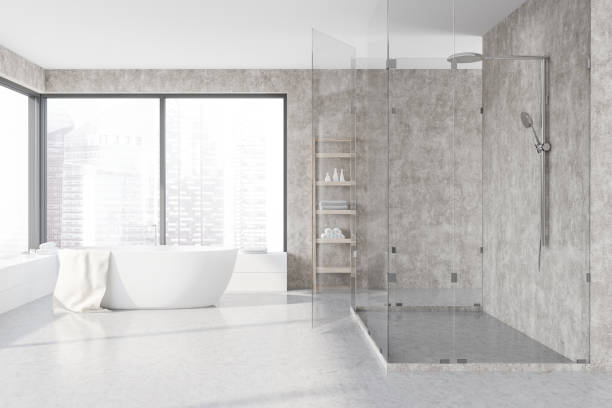 istock Concrete bathroom interior, tub and shower 1125950192