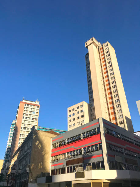 istock Buildings in a big city low angle view 1125951365