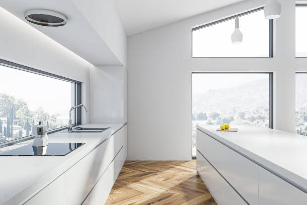 istock White kitchen countertops and island 1125951543