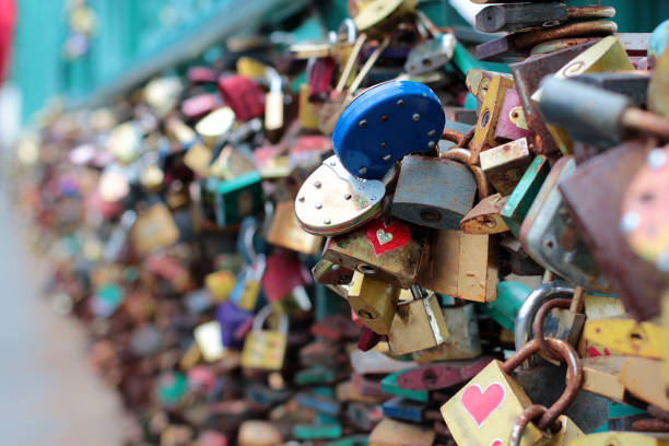 istock Many wedding locks on the bridge in Prague. Beautiful wedding background. Background for wedding photo books. 1125951637