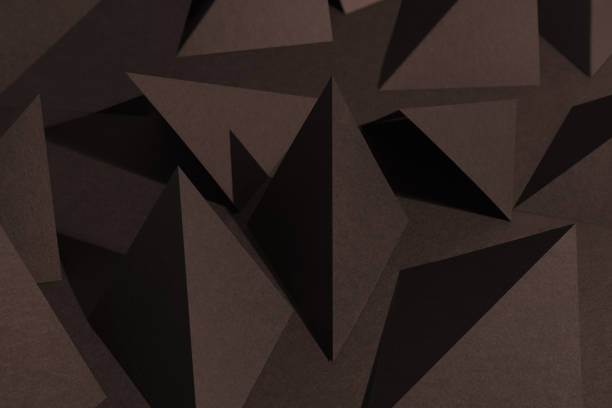 istock Close-up of paper pyramids, composition for abstract background 1125952620