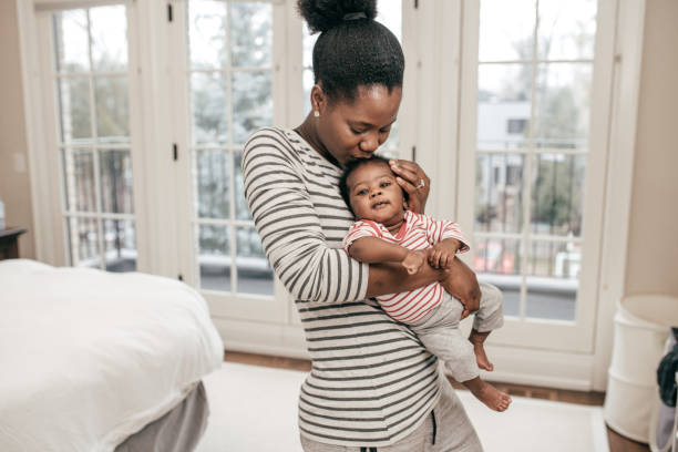 istock mom and newborn baby 1125955872