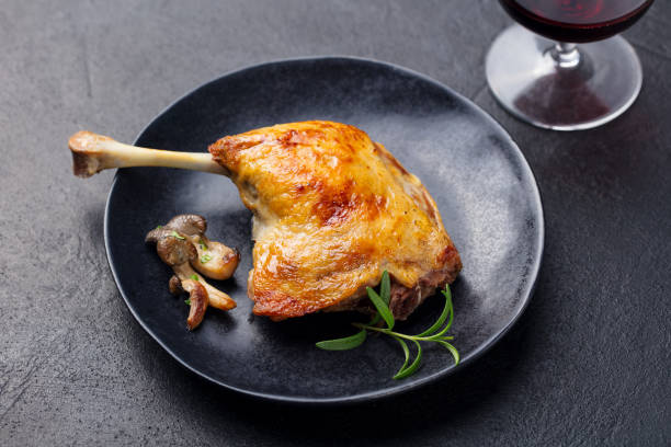 istock Duck legs confit with mushroom sauce . Restaurant serving. Close up. 1125957568