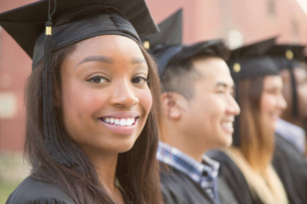 istock African descent female college student graduation on campus. 1125958120