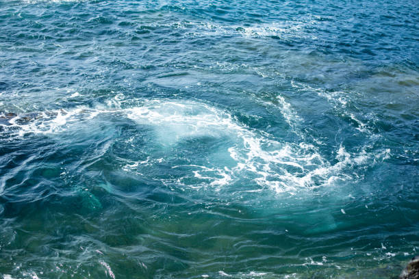 istock Waves splashing against the rocks. Lanzarote island. 1125958221