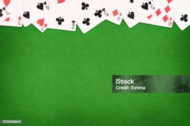 Cards On Green Felt Casino Table Background Stock Photo - Download Image Now - Playing Card, Casino, Backgrounds