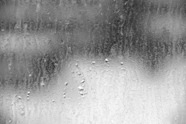 istock Background texture of a water drop on dirty glass 1125967042