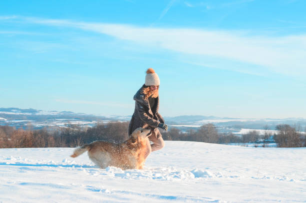 istock Girl with her golden retriever 1125970134