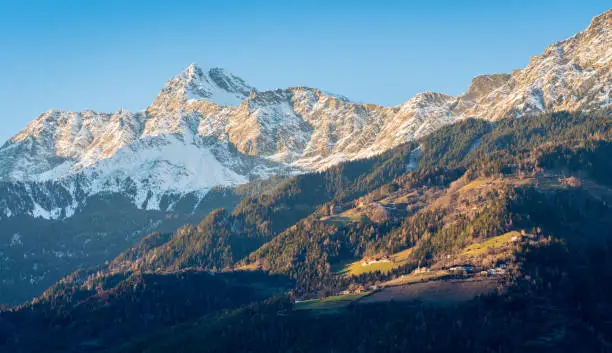 Photo of Snowy mountains surrounding Merano. Trentino Alto Adige, northern Italy.