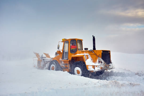 istock Snowblower at work in the mountains 1125976690