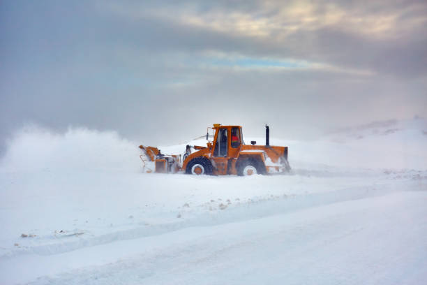 istock Snowblower at work in the mountains 1125976695