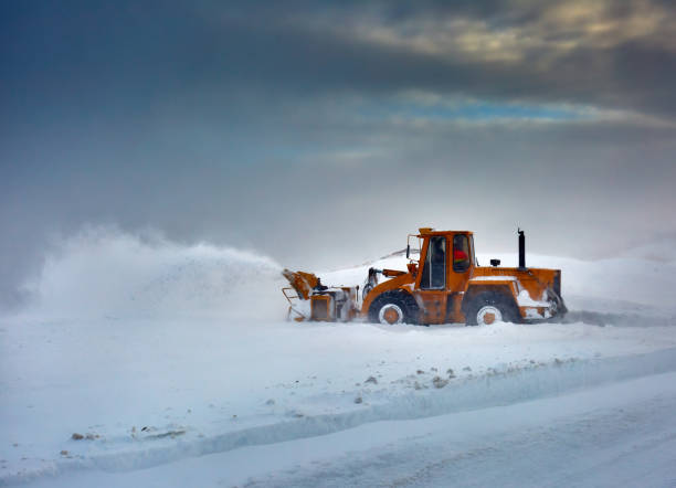 istock Snowblower at work in the mountains 1125976697
