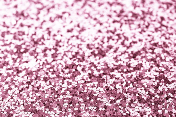istock Rose gold glitter texture. Festive sparkling sequins background closeup. 1125978996