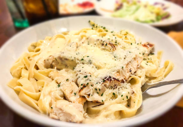 istock Italian pasta fettuccine alfredo 1125980126
