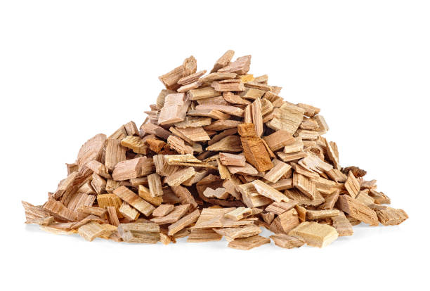 istock Pile of wood smoking chips isolated on white background 1125980326