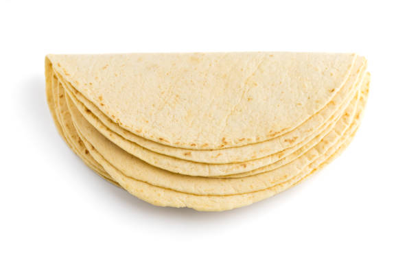 istock Tortilla on a white background. Several Mexican tortilla on a white background. 1125984794